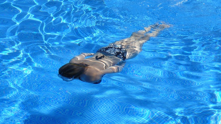Woman swimming underwater