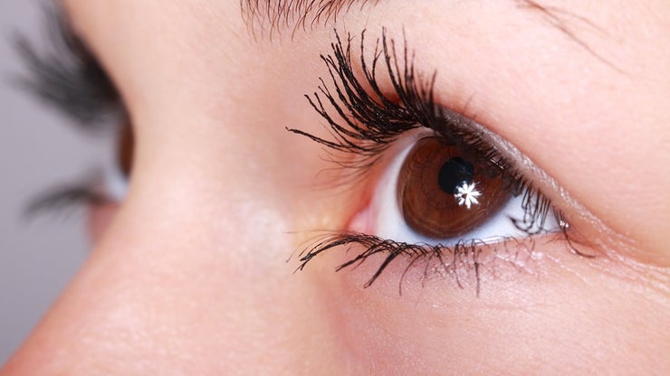 Closeup of brown eyes.